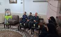 دیدار مسئولان شبکه بهداشت و درمان ایذه با خانواده شهید بهنام نوروزی